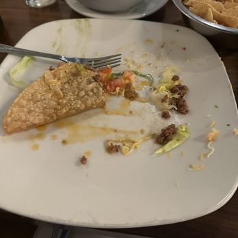 Serranos - Less than half of my Crispy Beef Taco - Mexican Near Me - Austin, Texas