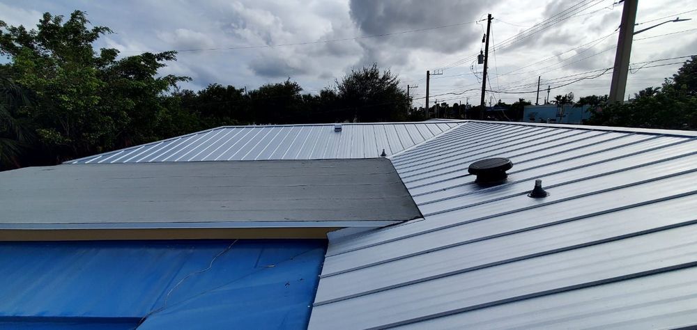 Slide of Dream Team Roofing