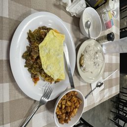 Breakfast omelette with just about every add in. Choose biscuit and asked for a side of gravy. They are so welcoming and accommodating here!