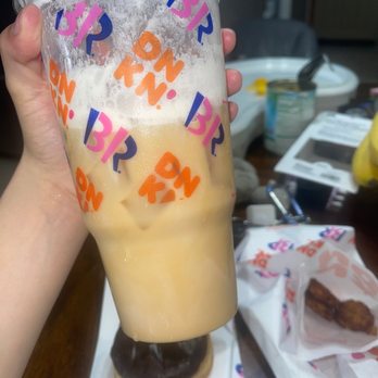 Dunkin' - a person holding a cup of iced coffee - Donuts Near Me - Homewood, Illinois Dunkin' - a person holding a cup of iced coffee - Donuts Near Me - Homewood, Illinois