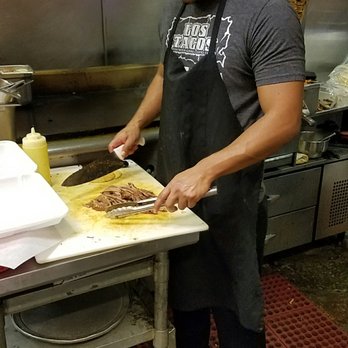 Los Tacos - Cutting meat for tacos - Mexican Near Me - Temecula, California Los Tacos - Cutting meat for tacos - Mexican Near Me - Temecula, California