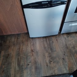 VERY small. Must get on the floor to access