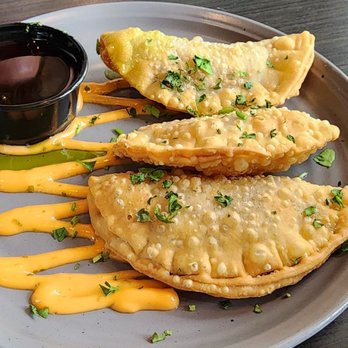 Roots Coastal Kitchen - Chicken empanadas - Caribbean Near Me - Río Grande, Puerto Rico Roots Coastal Kitchen - Chicken empanadas - Caribbean Near Me - Río Grande, Puerto Rico