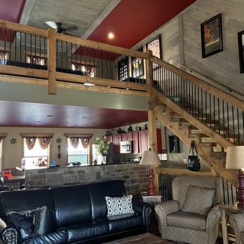 Eden Crest Vacation Rentals - Living room looking up to game room - Vacation Rentals Near Me - Pigeon Forge, Tennessee