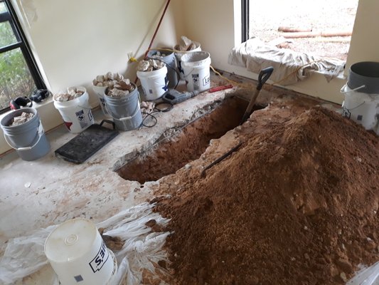 Repaired Broken Drain Lines under Foundation - Re tunneled under the Slab and cut out the broken drains and replaced them. These are before and after photos.