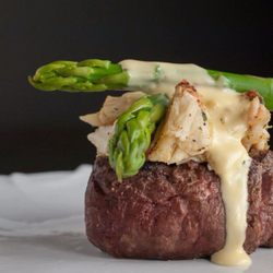 Taste of Texas - Filet Oscar -- center cut filet topped with 2 oz. of jumbo crab cake and hollandaise sauce