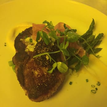 Siena Restaurant - Pork Ribeye with fig and Gorgonzola over asparagus, parsnip purée, and prosciutto. - Diners Near Me - Snyder, New York