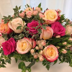 Sunflorist - Old world garden roses in a mercury glass pedestal container.