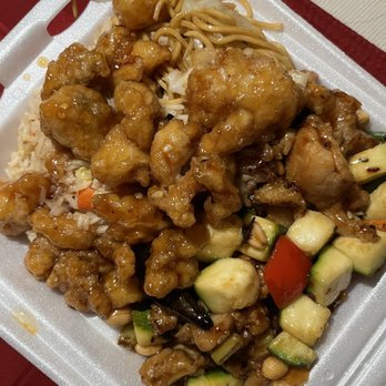 Panda Express - Large plate - 3 sides. Half Side Chow Mein, half fried rice. 2 Kung Pao chicken, one orange chicken. - Chinese Near Me - Dedham, Massachusetts