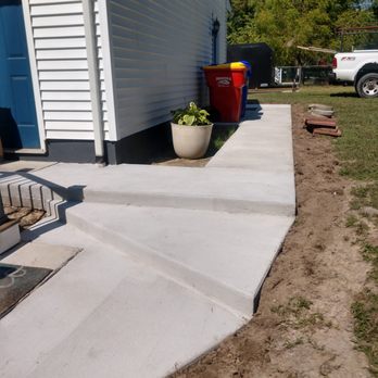 Lilly lawn and landscaping - Concrete walkway with cool angled steps - Landscaping Near Me Lilly lawn and landscaping - Concrete walkway with cool angled steps - Landscaping Near Me