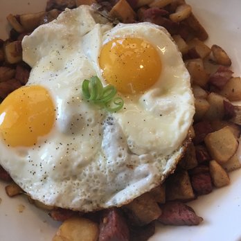 Moena Café - Corn beef hash with sunny side up eggs. Cooked perfectly. - Cafes Near Me - Honolulu, Hawaii Moena Café - Corn beef hash with sunny side up eggs. Cooked perfectly. - Cafes Near Me - Honolulu, Hawaii