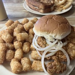 Borden Buckboard Diner - Hand breaded pork tenderloin with onions and tots