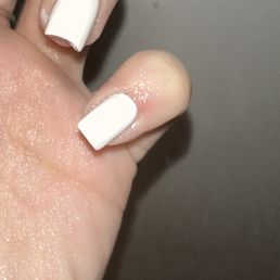 One cuticle that was SAWED OFF that broke while I was in the shower and started bleeding. can't tell because I'm wet of course. One cuticle that was SAWED OFF that broke while I was in the shower and started bleeding. can't tell because I'm wet of course.