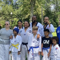 Master Malarkey - Students getting promoted to their next level belt. Master Chris Malarkey is in the middle.