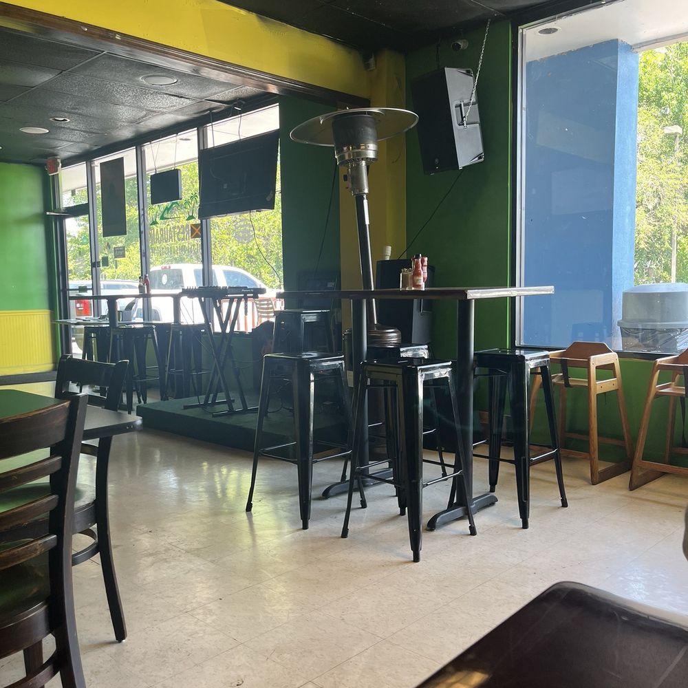 Caribbean Delight - Seating by the stage - Caribbean Near Me - Moncks Corner, South Carolina
