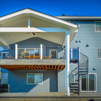 TnT Builders - a two story home with a spiral staircase leading up to the second floor - General Contractors Near Me - Albany, Oregon TnT Builders - a two story home with a spiral staircase leading up to the second floor - General Contractors Near Me - Albany, Oregon