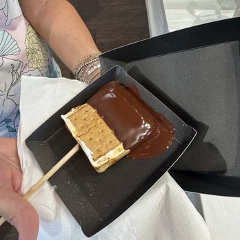 Hampton Chocolate Factory - Frozen smore on a stick - Chocolatiers & Shops Near Me - Tampa Bay, Florida Hampton Chocolate Factory - Frozen smore on a stick - Chocolatiers & Shops Near Me - Tampa Bay, Florida