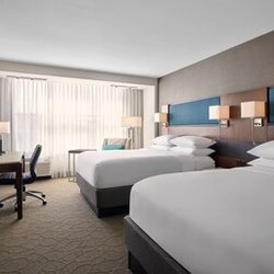 Delta Hotels Milwaukee Northwest - Clean, easy and inviting. Our double queen room has it all and is the epitome of clean.