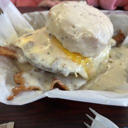Pork Savage= one huge biscuit, 2 or 3 slices of bacon, 2 large sausage patties, cheddar cheese and gravy.