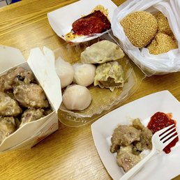 Black bean short ribs, shrimp dumplings, sesame balls.