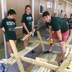 HandsOn New Orleans - Tulane students help build picnic tables at Eisenhower elementary.