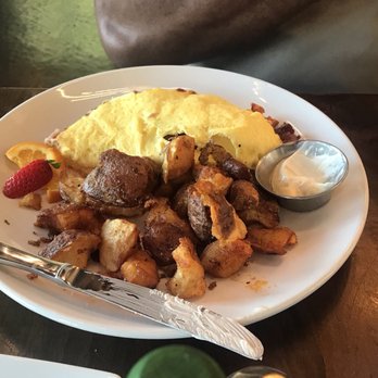 Four Friends Kitchen - Ham and sausage omelette with potatoes - Southern Near Me - Denver, Colorado Four Friends Kitchen - Ham and sausage omelette with potatoes - Southern Near Me - Denver, Colorado