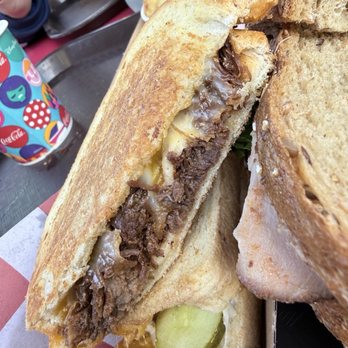 Woody's Lunch Box - BBQ Brisket Melt - Sandwiches Near Me - Lake Buena Vista, Florida Woody's Lunch Box - BBQ Brisket Melt - Sandwiches Near Me - Lake Buena Vista, Florida