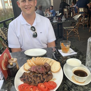 1933 Lounge - Beef platter - 2 med rare steaks, French bread, caramelized onions, raw sliced tomatoes, horseradish sauce and au jus - Steakhouses Near Me - Fishers, Indiana