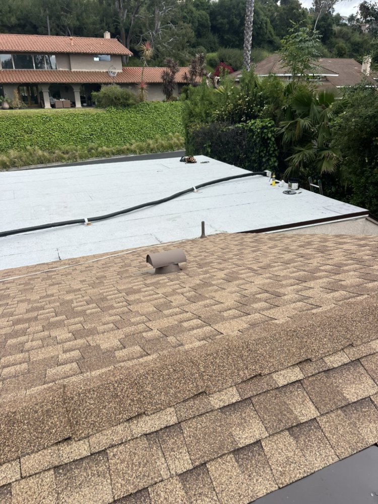 Slide of JVR Quality Roofing