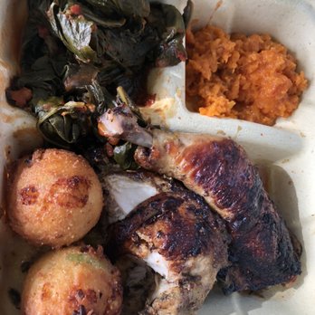 Marjorie - College greens, hush puppies, Jamaican jerk chicken, sweet potatoes. (This is half a portion cuz I gave some to my friend) - Burgers Near Me - Seattle, Washington