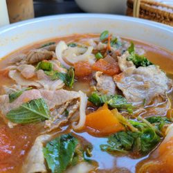 Spicy tomato beef noodles soup