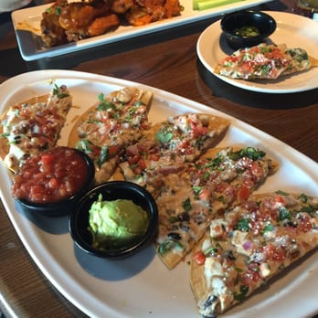 TGI Fridays - TGI's version of nachos. Weird but really tasty. - American Near Me - Bel Air, Maryland TGI Fridays - TGI's version of nachos. Weird but really tasty. - American Near Me - Bel Air, Maryland