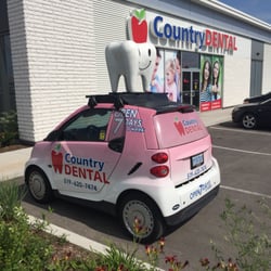 Country Dental - A Little Pink car with the Country Dental Clinic logo. Very Cool.