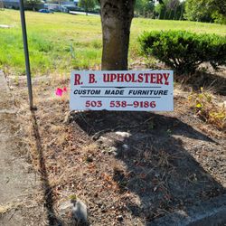 R B Upholstery - Sign in front of building.