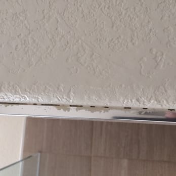 RAM Painting - Very expensive metal trim around tiles was painted in several places - Painters Near Me - North Las Vegas, Nevada