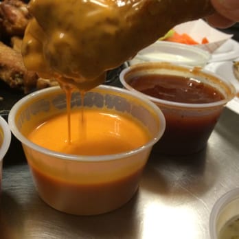 Epic Wings - Yummy buttery medium hot sauce. - Chicken Wings Near Me - Murrieta, California Epic Wings - Yummy buttery medium hot sauce. - Chicken Wings Near Me - Murrieta, California