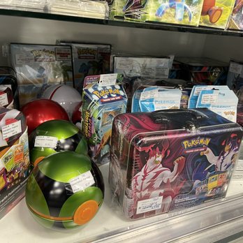 Brass Armadillo Antique Mall - Pokémon poke-tins and lunch box chest - Antiques Near Me - Des Moines, Iowa
