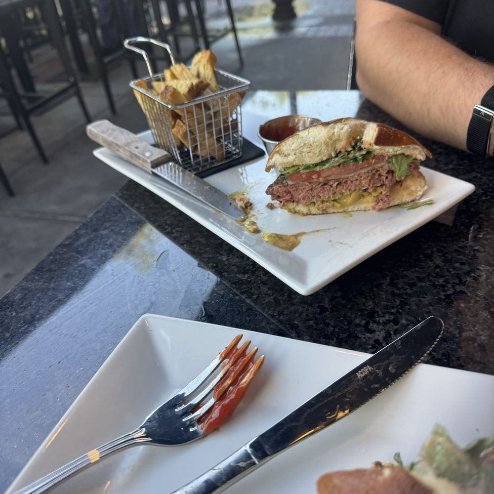 The Hangry Bison - The hangry bison burger and deceptive looking fries. - Burgers Near Me - Winter Garden, Florida