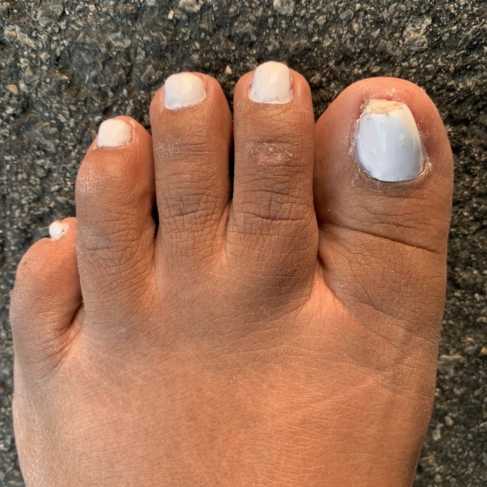 Hong Kong Nail Salon - The nail technician sent me home looking like this. Nail color is all uneven and I got gel polish. - Nail Salons Near Me - Reno, Nevada