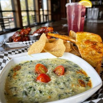 Craft Republic - Albuquerque - a bowl of spinach dip and chips - Burgers Near Me - Albuquerque, New Mexico