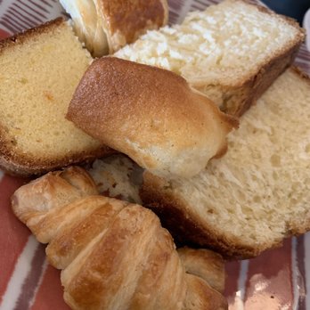 Loupiotte Kitchen - Morning Happiness with croissant, pain au chocolat, Madeleine, cake, brioche and blackcurrant jam on the side - French Near Me - Los Angeles, California