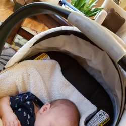 Berliner Carl M MD - Baby in the clinic waiting room waiting for his 2 month well check appointment.