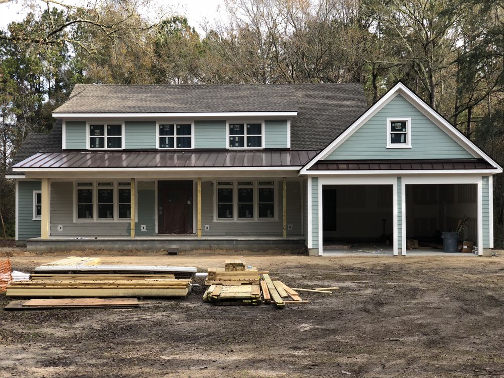 Slide of Canaan roofing and gutters