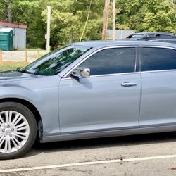 Econo Auto Painting & Bodyworks - 2014 Chrysler 300 C. Looks great.