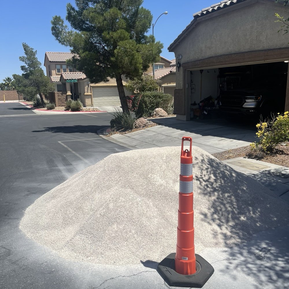 Big Bully Turf - Chat dumped on street in front of house day before install, barely blocking driveway of neighbors. - Landscaping Near Me - Henderson, Nevada Big Bully Turf - Chat dumped on street in front of house day before install, barely blocking driveway of neighbors. - Landscaping Near Me - Henderson, Nevada