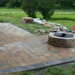 Endris Landscaping - Patio with pavers and a fire pit