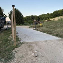 Crystal Lake Campground - Look...a picnic table graveyard right next to us! Gee....what a safe place for your kids to play!!