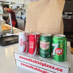 Round Table Pizza - Deal includes pop ~