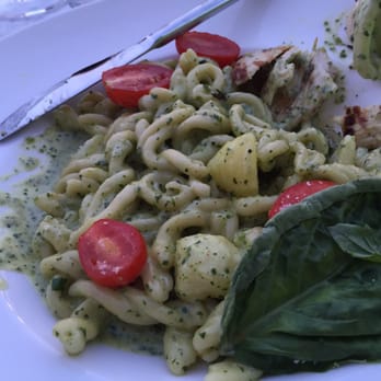 Greenhouse Kitchen + Bar - Pasta with a creamy pesto sauce and plum tomatoes. My son customized it and added chicken but it didn't need it. It was sooooo good. - Cocktail Bars Near Me - Vienna, Virginia