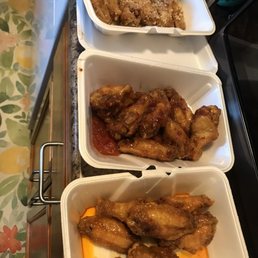 From top to bottom: Garlic Parmesan, Raspberry Chili and Honey Hot Wings